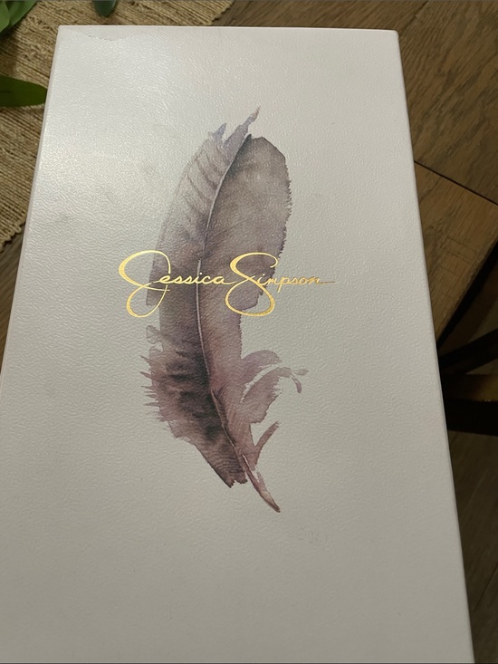 Jessica Simpson Shoes - Jessica Simpson White Box with Mauve Feather and Gold Logo